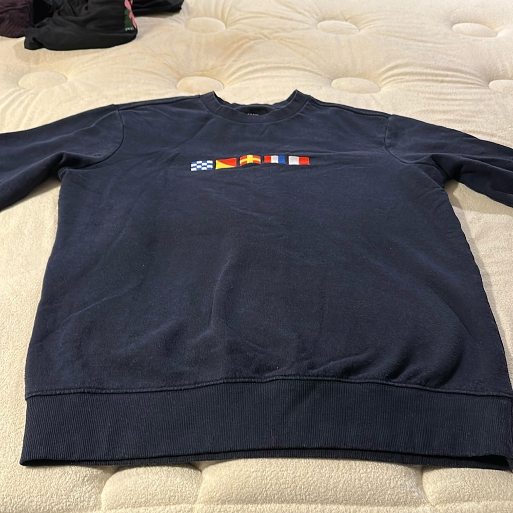 Navy blue men’s size Medium sweat shirt. With embroidery logos size medium.